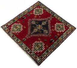 Corner detail of 2000s Shiraz rug showing border pattern and Wool pile