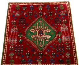 Surface texture of 2000s Shiraz rug with natural Wool and intricate pattern