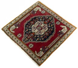 Corner detail of 2000s Shiraz rug showing border pattern and Wool pile