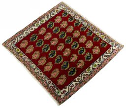 Corner detail of 2000s Shiraz rug showing border pattern and Wool pile