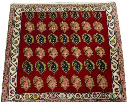 Surface texture of 2000s Shiraz rug with natural Wool and intricate pattern