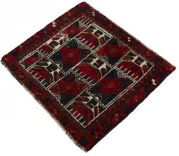 Corner detail of 2000s Shiraz rug showing border pattern and Wool pile