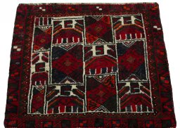 Surface texture of 2000s Shiraz rug with natural Wool and intricate pattern