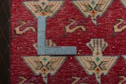 Backside of handmade 2000s Shiraz rug showing knot structure and weave density