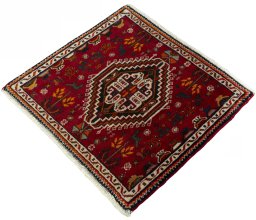 Corner detail of 2000s Shiraz rug showing border pattern and Wool pile