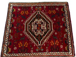 Surface texture of 2000s Shiraz rug with natural Wool and intricate pattern