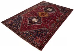 Corner detail of 1970s Shiraz rug showing border pattern and Wool pile