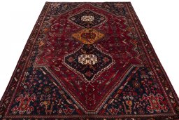 Surface texture of 1970s Shiraz rug with natural Wool and intricate pattern