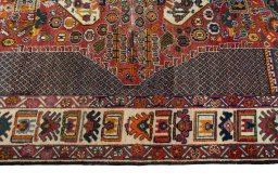 Close-up detail of 1970s Shiraz rug from Iran / Persia showing Wool weave