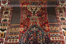 Full view of 1970s Shiraz rug from Iran / Persia, 251 × 150 cm in Red tones