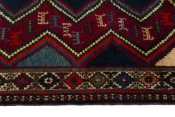 Close-up detail of 2000s Shiraz rug from Iran / Persia showing Wool weave