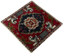 Corner detail of 2000s Shiraz rug showing border pattern and Wool pile
