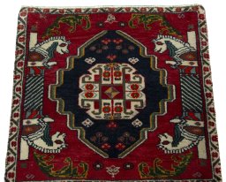 Surface texture of 2000s Shiraz rug with natural Wool and intricate pattern