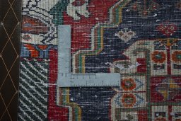 Backside of handmade 2000s Shiraz rug showing knot structure and weave density