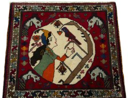 Surface texture of 2000s Shiraz rug with natural Wool and intricate pattern