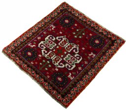 Corner detail of 2000s Shiraz rug showing border pattern and Wool pile