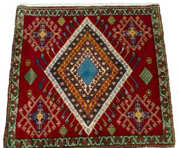 Surface texture of 2000s Shiraz rug with natural Wool and intricate pattern