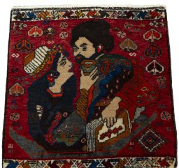 Surface texture of 2000s Shiraz rug with natural Wool and intricate pattern