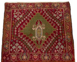 Surface texture of 2000s Shiraz rug with natural Wool and intricate pattern