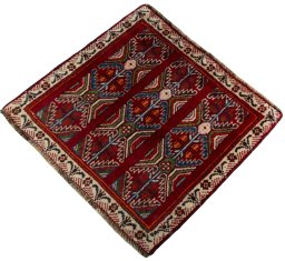 Corner detail of 2000s Shiraz rug showing border pattern and Wool pile