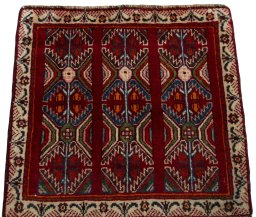 Surface texture of 2000s Shiraz rug with natural Wool and intricate pattern
