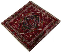 Corner detail of 2000s Shiraz rug showing border pattern and Wool pile