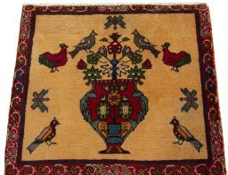 Surface texture of 2000s Shiraz rug with natural Wool and intricate pattern