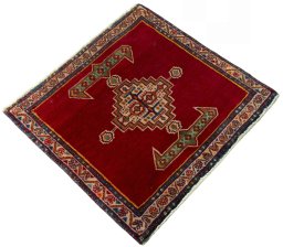 Corner detail of 2000s Shiraz rug showing border pattern and Wool pile