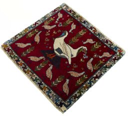 Corner detail of 2000s Shiraz rug showing border pattern and Wool pile