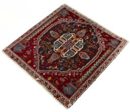 Corner detail of 2000s Shiraz rug showing border pattern and Wool pile