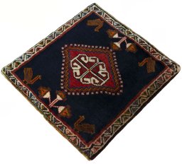 Corner detail of 2000s Shiraz rug showing border pattern and Wool pile