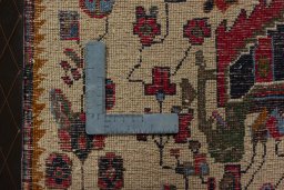 Backside of handmade 2000s Shiraz rug showing knot structure and weave density