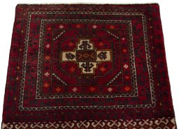 Surface texture of 2000s Shiraz rug with natural Wool and intricate pattern