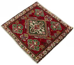 Corner detail of 2000s Shiraz rug showing border pattern and Wool pile