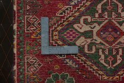 Backside of handmade 2000s Shiraz rug showing knot structure and weave density