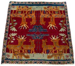 Surface texture of 2000s Shiraz rug with natural Wool and intricate pattern