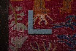 Backside of handmade 2000s Shiraz rug showing knot structure and weave density