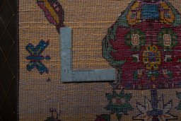 Backside of handmade 2000s Shiraz rug showing knot structure and weave density