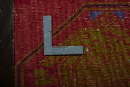 Backside of handmade 2000s Shiraz rug showing knot structure and weave density