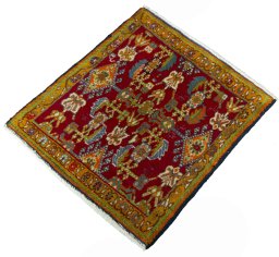 Corner detail of 2000s Shiraz rug showing border pattern and Wool pile