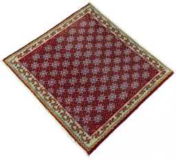 Corner detail of 2000s Shiraz rug showing border pattern and Wool pile