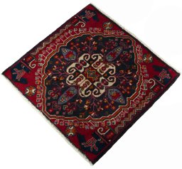 Corner detail of 2000s Shiraz rug showing border pattern and Wool pile