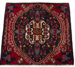 Surface texture of 2000s Shiraz rug with natural Wool and intricate pattern