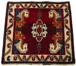 Surface texture of 2000s Shiraz rug with natural Wool and intricate pattern