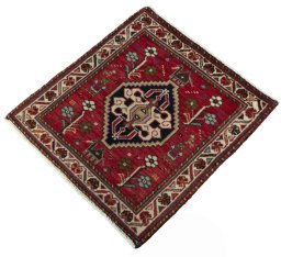 Corner detail of 2000s Shiraz rug showing border pattern and Wool pile