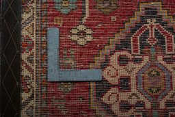 Backside of handmade 2000s Shiraz rug showing knot structure and weave density