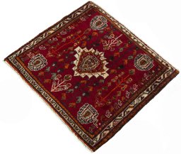 Corner detail of 2000s Shiraz rug showing border pattern and Wool pile
