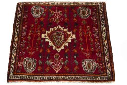 Surface texture of 2000s Shiraz rug with natural Wool and intricate pattern