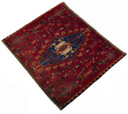 Corner detail of 2000s Shiraz rug showing border pattern and Wool pile