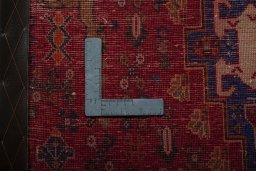 Backside of handmade 2000s Shiraz rug showing knot structure and weave density